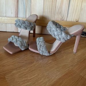 Steve Madden size 7.5 Heels. Never worn outside of my house. Too high for me.
